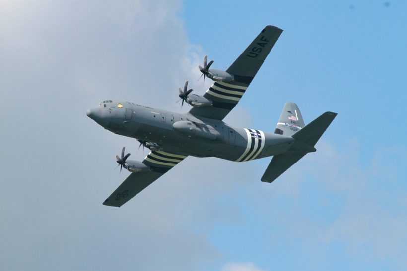 The image shows a Lockheed Martin C-130J Super Hercules military transport aircraft.