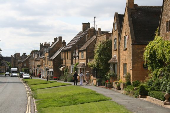 Honey coloured stone cottages on the High Street in Broadway Worcestershire